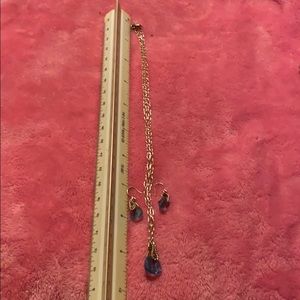 Silver and blue stone with matching earrings.